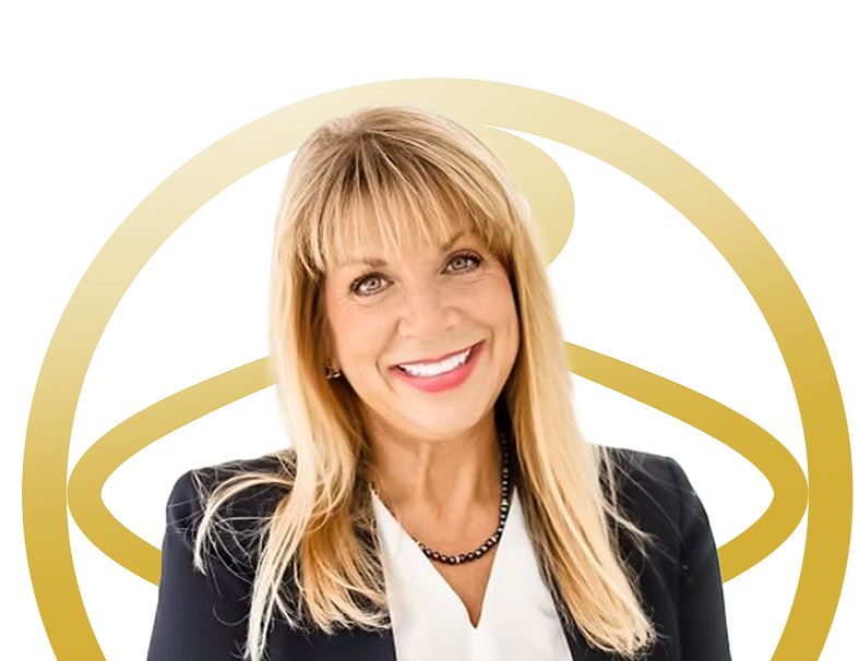 Portrait of Shelley Henry smiling, with the Amity emblem in the background.